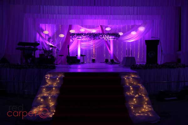 purple theme stage with illuminated entrance steps 